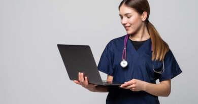 young female doctor working isolated white